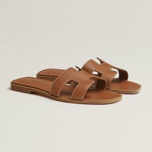 Authentic Hermès Oran Sandals in 'Gold'